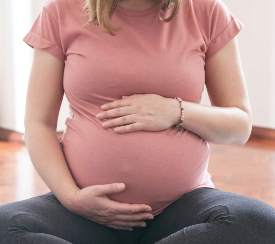 Pregnant woman receiving gentle chiropractic care