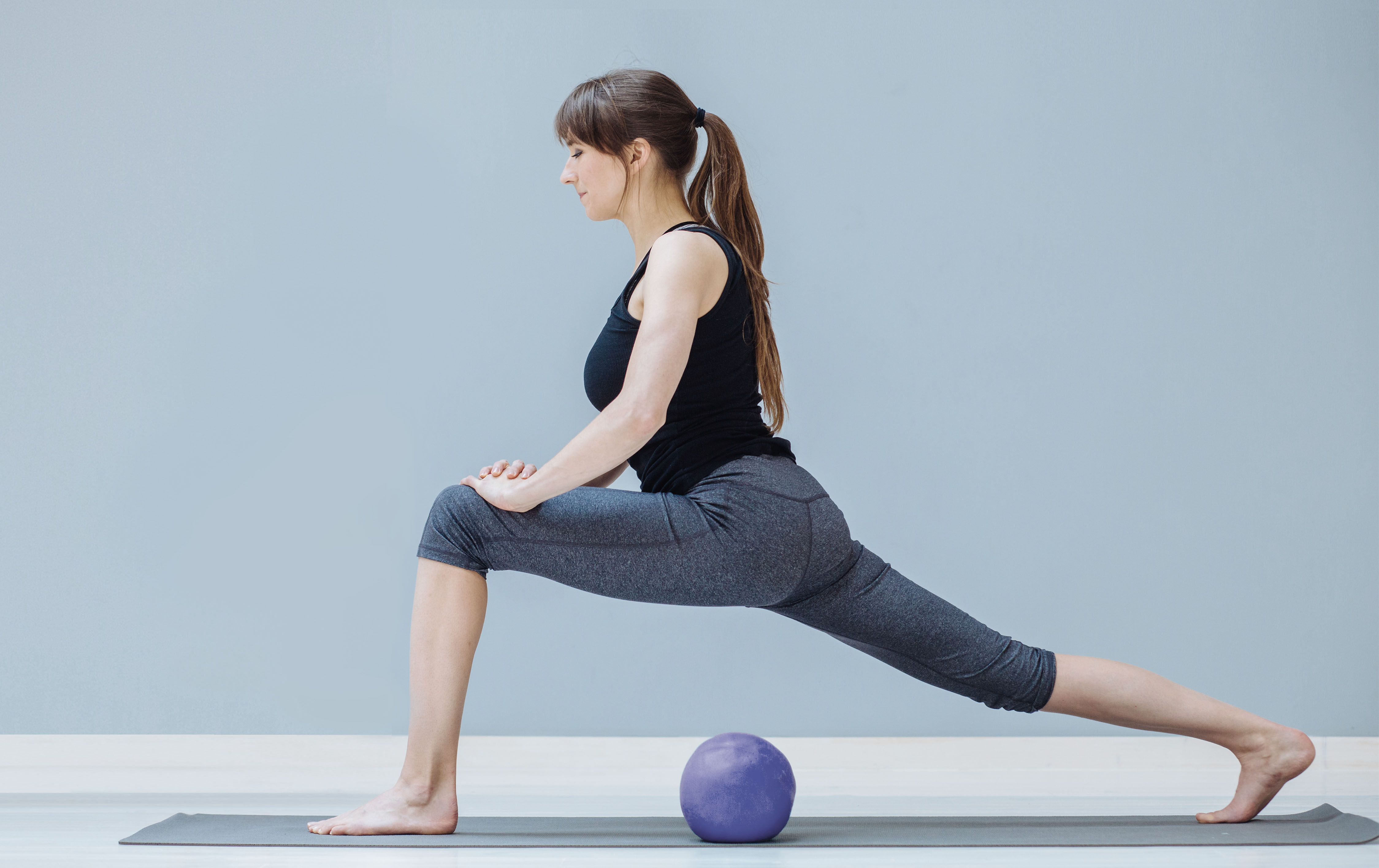 Woman practising pilates