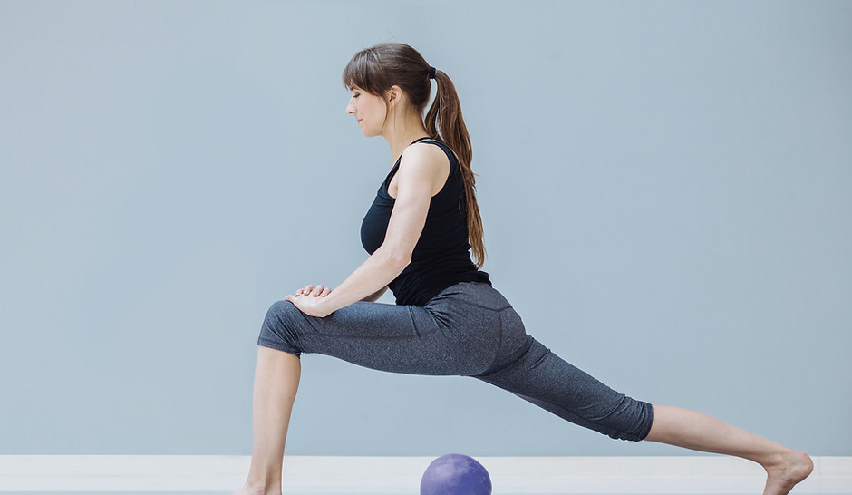 Woman Practising Pilates
