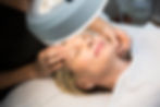 Aesthetic expert working on a client