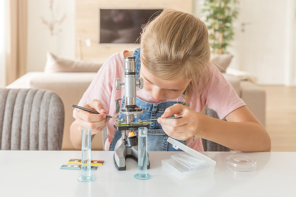 Girl Using Microscope