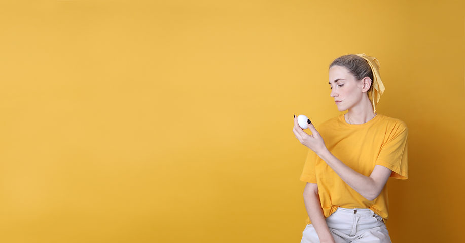 Girl Holding an Egg