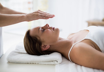 Woman on massage bed