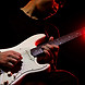 A man playing guitar