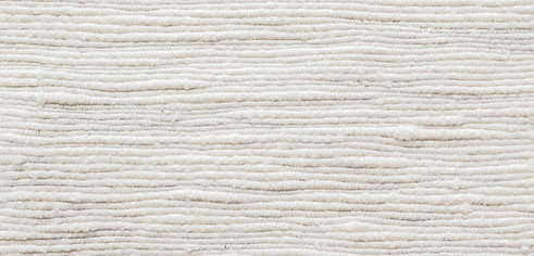 Surface en tissu blanc texturé