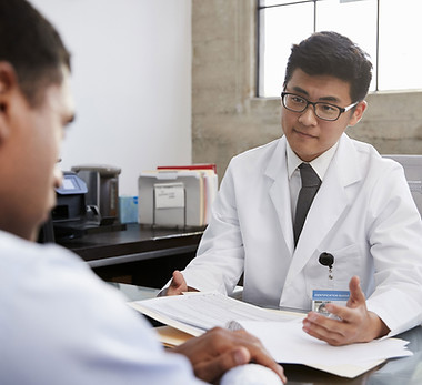 Doctor consulting patient