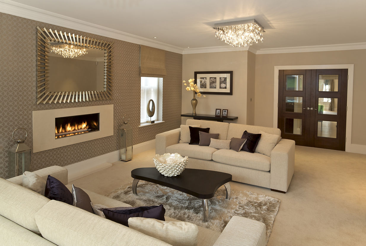 A large living room in an expensive new house that has been furnished by a leading Interior