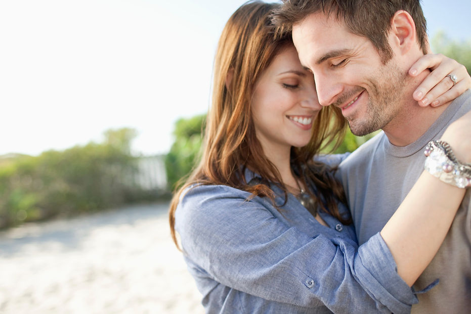Portrait of mid adult couple embracing