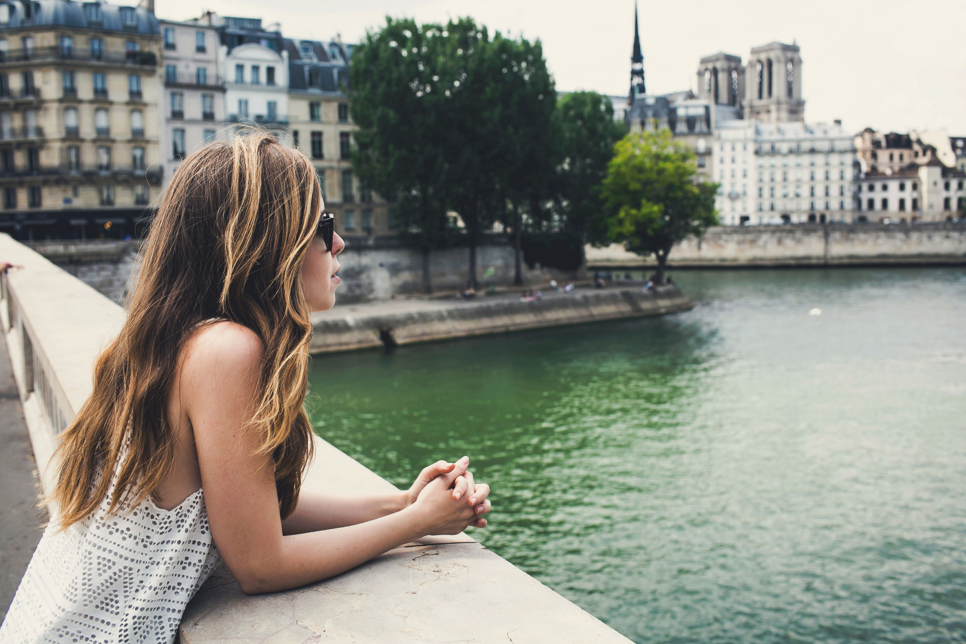 woman looking into water