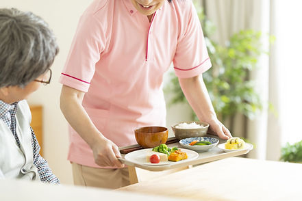 Tray of Food being served up by a carer