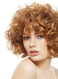Young beautiful sexy woman with curly hair over white background