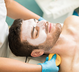 Man receiving facial treatment