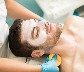 Man receiving facial treatment