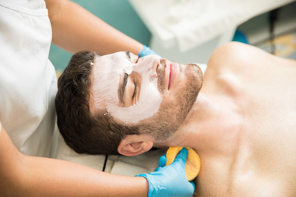 Man receiving facial treatment