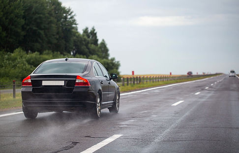 Car on Wet Road