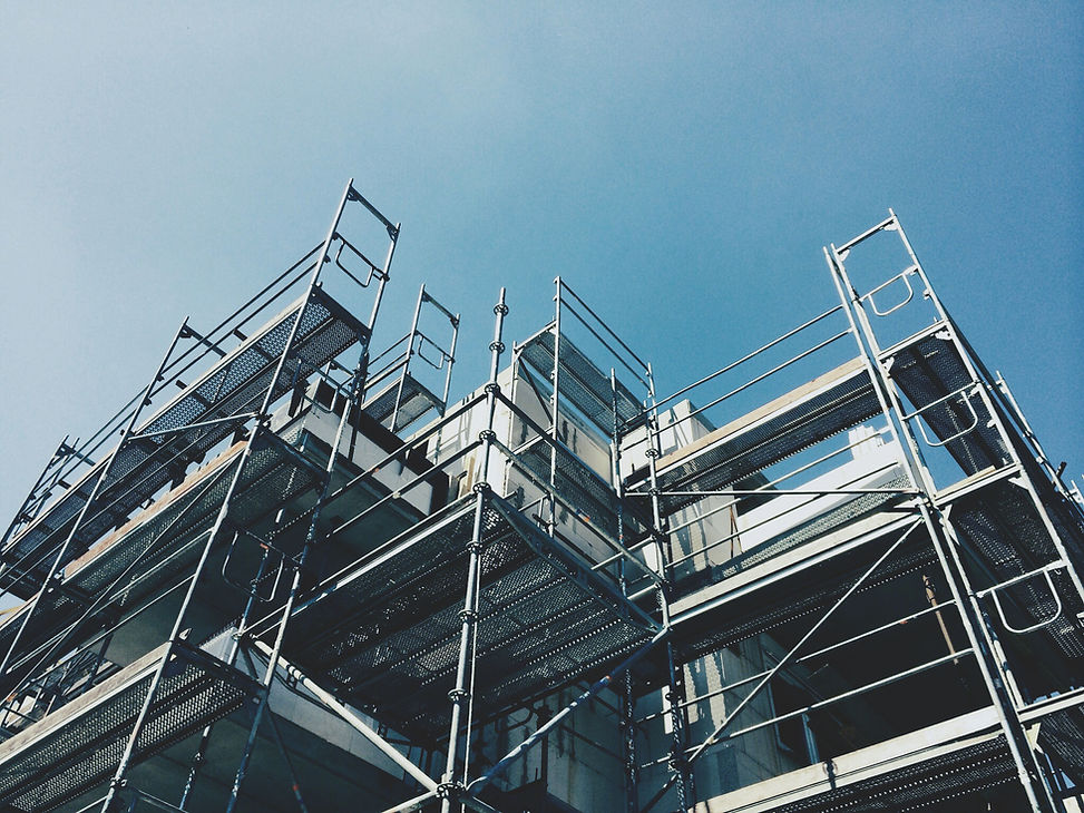 Scaffolding structure on exterior of commercial building