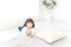 Kid Lying On Stomach