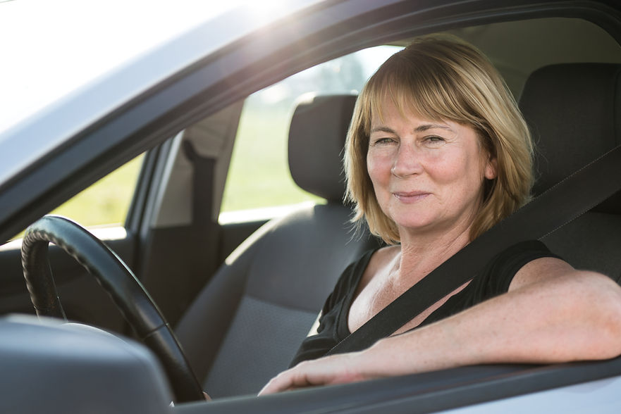 Smiling Woman Driving