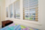 Bedroom window with opened blinds. Super wide 12mm lens on a FF sensor