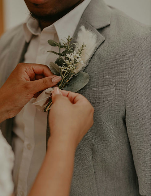 Pinning the Boutonniere