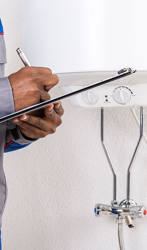 Technician Inspecting Boiler
