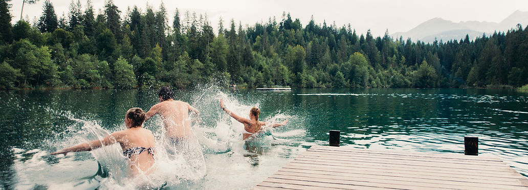 People jumping into water