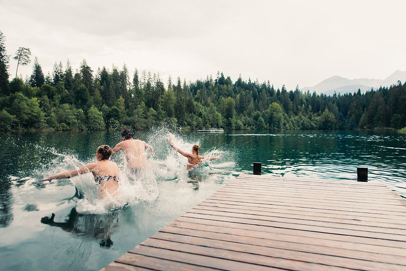 People jumping into water
