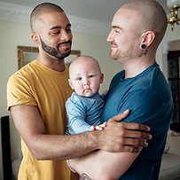 Family Holding Baby