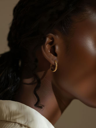 Gold Hoop Earring on Woman