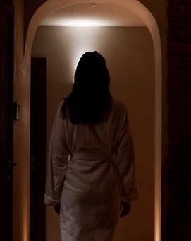 Silhouette In Hallway
