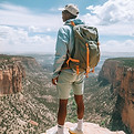 Man Hiking Cliff