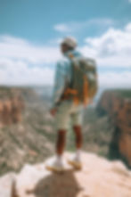Man Hiking Cliff