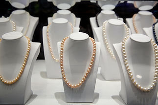 Pearl necklaces hanging for sale in Phu Quoc, Vietnam