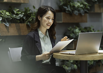 Asian woman having an online meeting on laptop