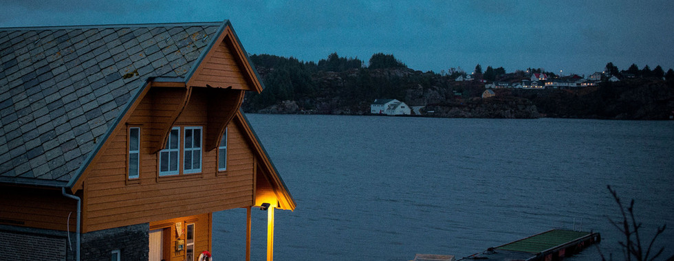 Twilight Photo of Cabin on the lake during blue hour