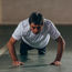 older man doing press ups