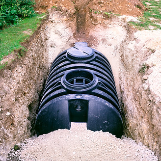 Installation of a drainage tank (septic tank) in a domestic garden. 4000 Litre Capacity