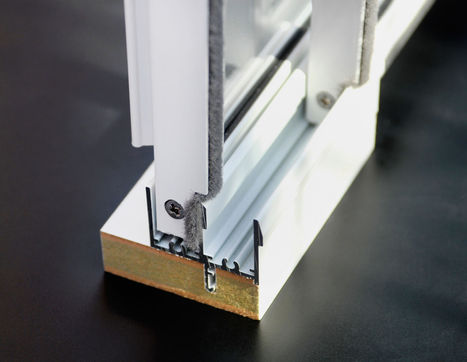 Secondary glazing on window, insulates heat and noise