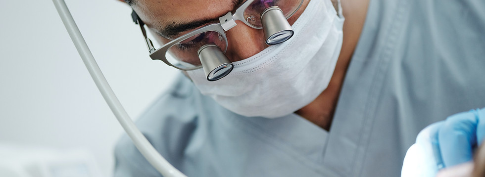 best dentist doing a root canal treatment with the latest technology