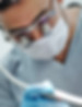 Oral surgeon performing dental procedure 