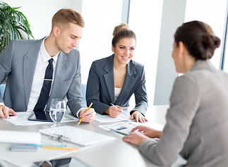 Young couple meeting with their financial advisor