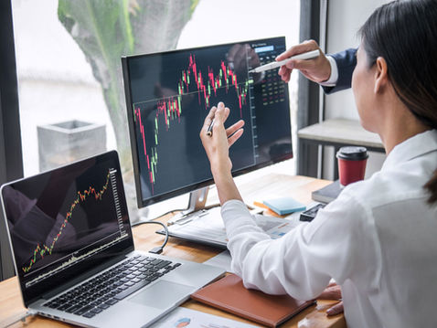 market strategist reviewing business market strategy