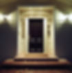 black door of a house with illuminated lights