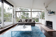 Sunroom with Blue Rug