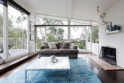 Sunroom with Blue Rug