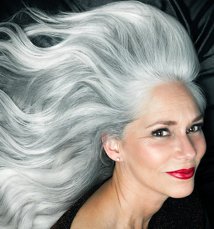 mature woman displaying her silver hair