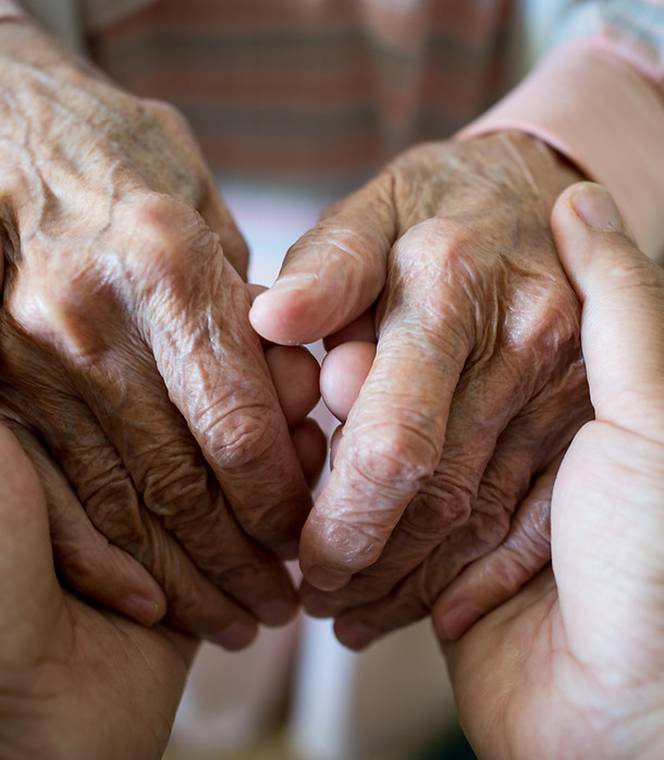 Young Hands Holding Old Hands