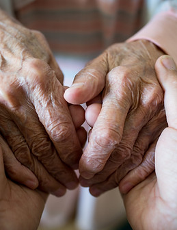 Young Hands Holding Old Hands