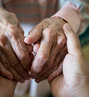 Young Hands Holding Old Hands