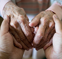 Young Hands Holding Old Hands